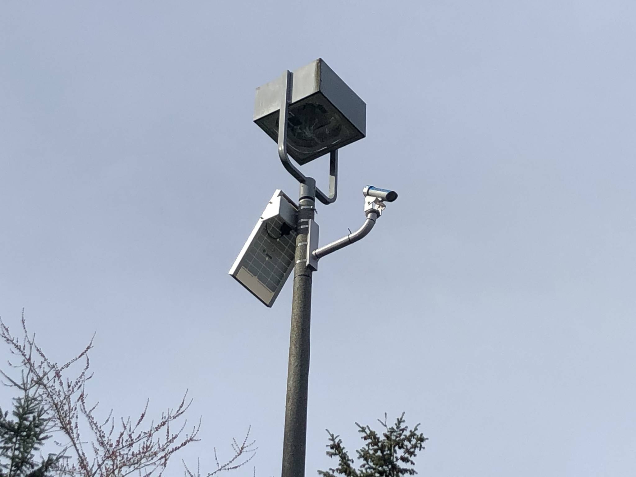 The city recently installed a laser pavement temperature sensor unit on a light pole in the Mercer Island City Hall parking lot. Courtesy of the city of Mercer Island