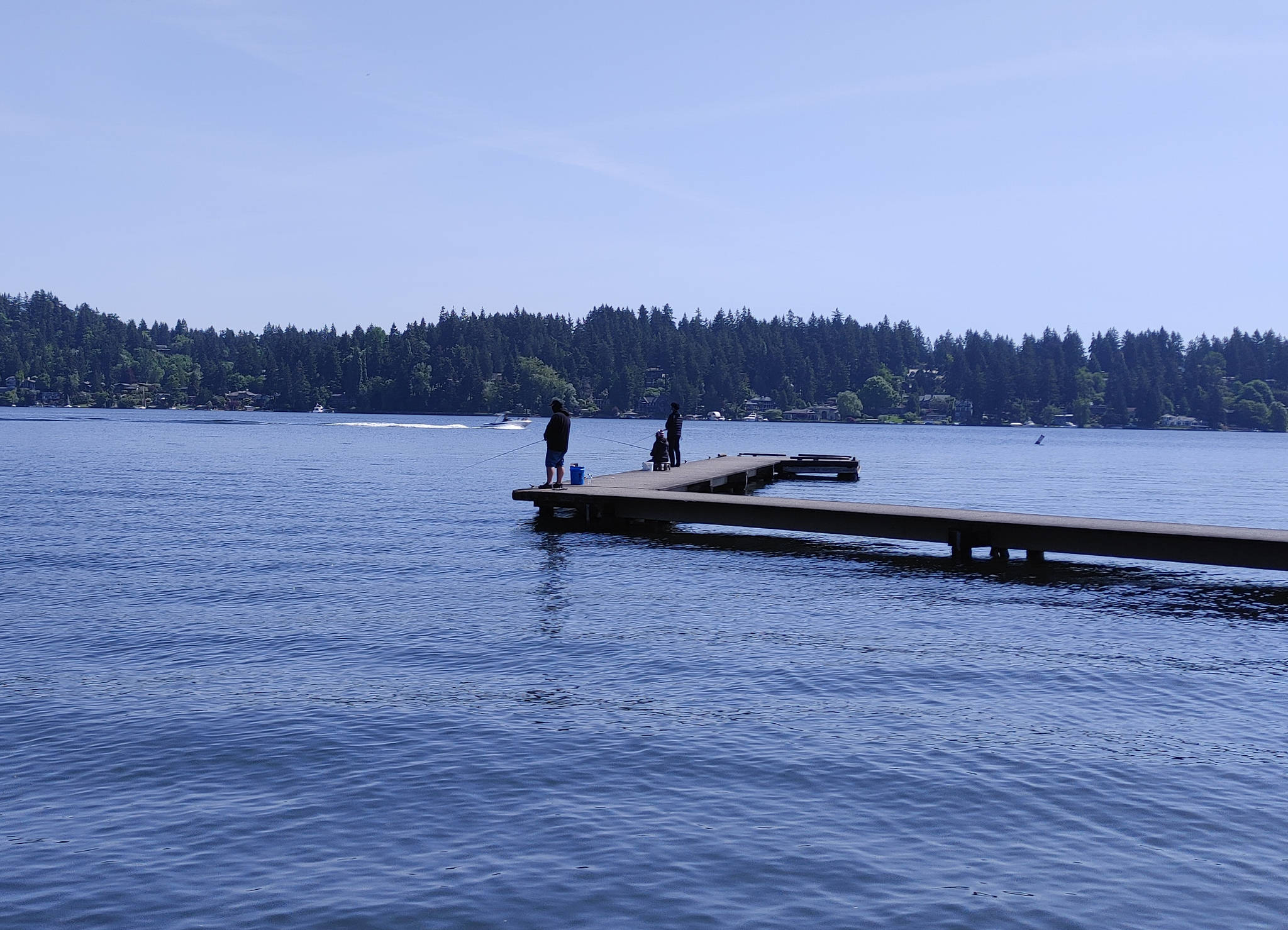 People get in some fishing off a Luther Burbank Park dock on a recent Saturday. Andy Nystrom/ staff photo