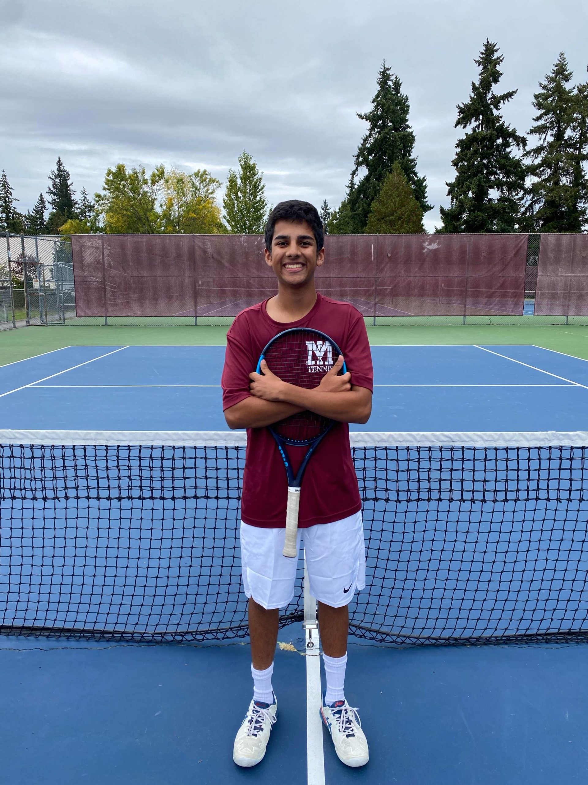 Mercer Island High School’s Ajay Manhas plays No. 2 singles and is one of the squad’s three captains. Courtesy photo