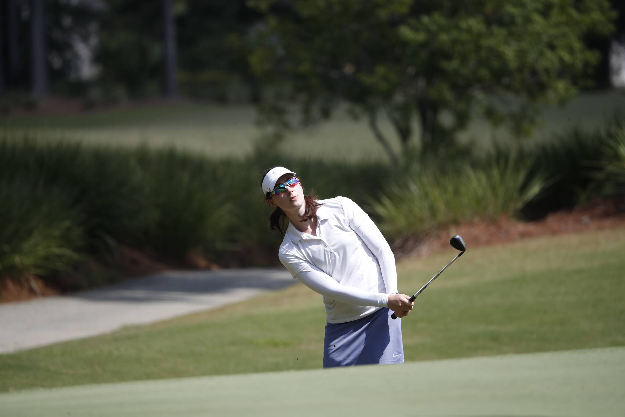 Mercer Island’s Jacqueline Bendrick takes a shot during her 1 up victory over Stephanie Gelleni of Venezuela in a Round of 32 match on Sept. 28 in the 34th U.S. Women’s Mid-Amateur Championship at Berkeley Hall Club in Bluffton, South Carolina. Later that day, 2015 champion Lauren Greenlief of the United States defeated Bendrick 2 up in a Round of 16 match. After qualifying for the Round of 64 in stroke play, Bendrick beat Julia Potter-Bobb of the United States, 5 and 3, to advance. A field of 132 golfers began the tournament on Sept. 25 in hopes of earning a United States Golf Association (USGA) title. Photo courtesy of Jeff Haynes/USGA