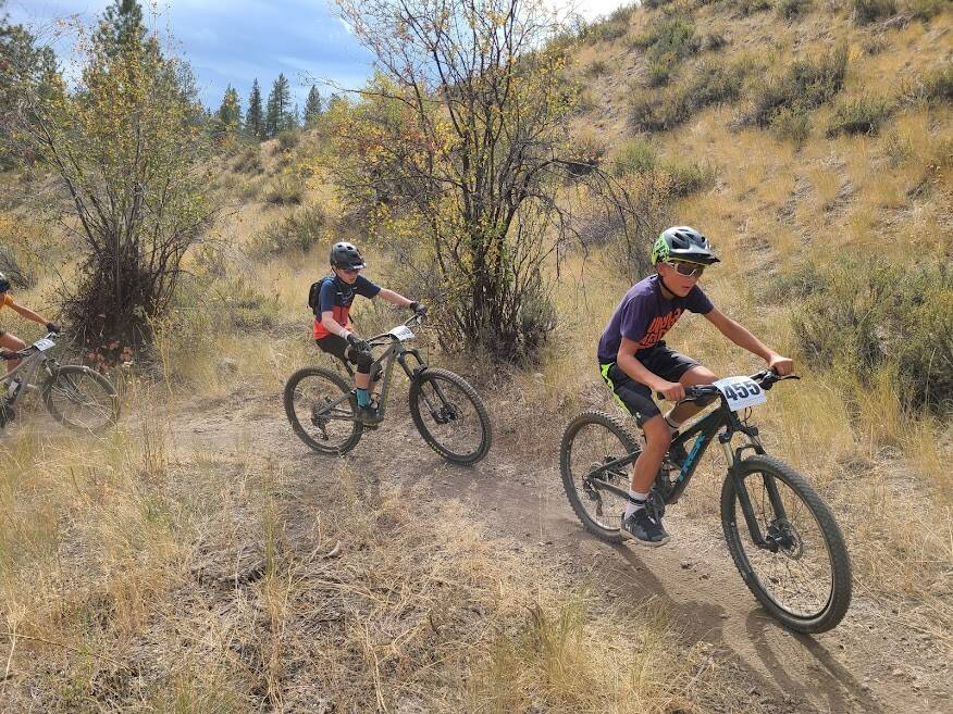 Mercer Island’s Zane Shiers (center) competes in the sixth-grade boys mountain biking race on Sept. 26 at Methow Valley. Shiers went on to take first over Ian Piacentino of Anacortes (right). Photo courtesy of Brian Shiers