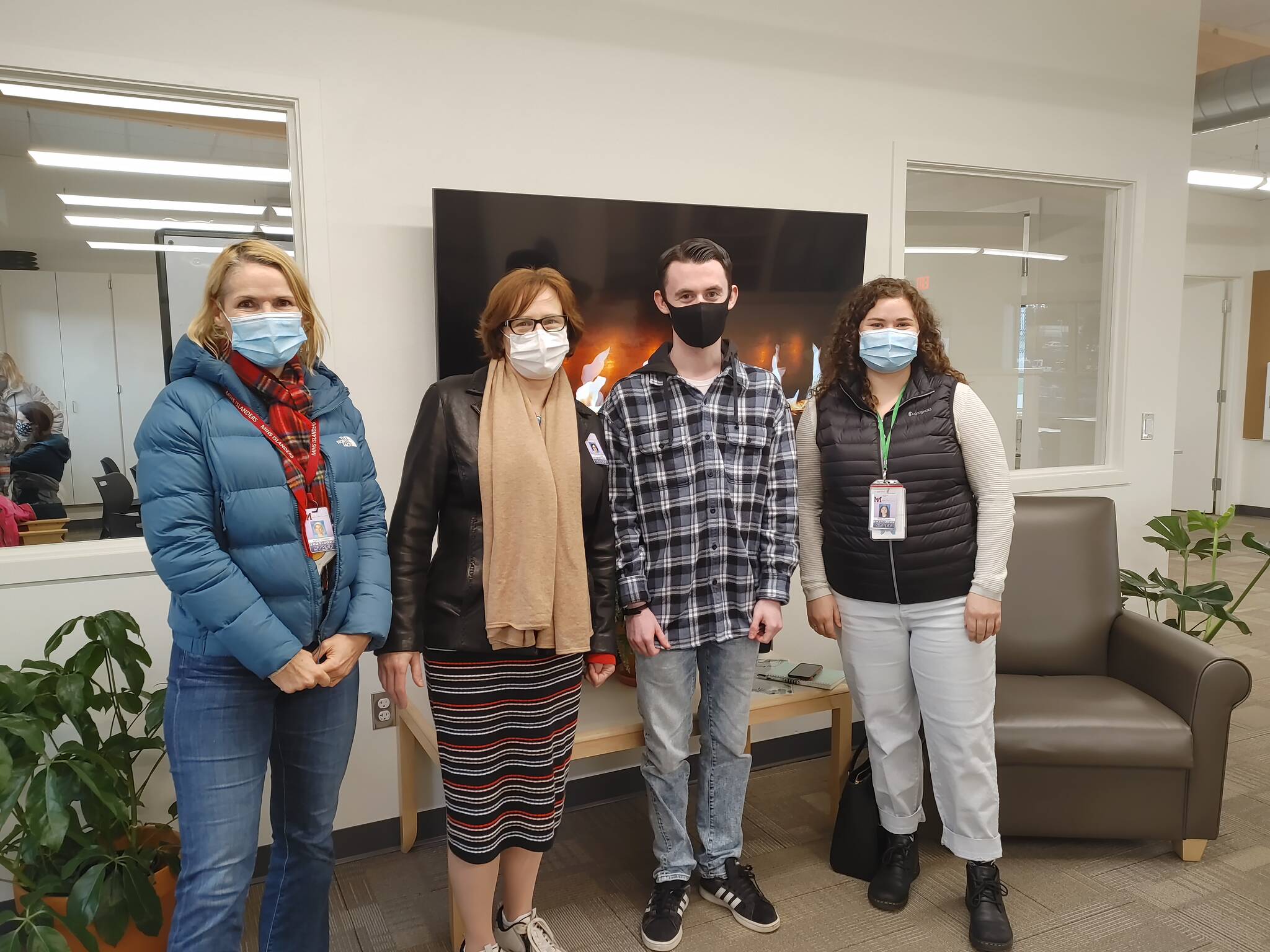 Left to right inside the new Pathways building: Teacher Karin Shelton; Dr. Sue Ann Bube, director for Mercer Island School District Special Services; student Joe McSwiney; and teacher Holly Purcell. Andy Nystrom/ staff photo