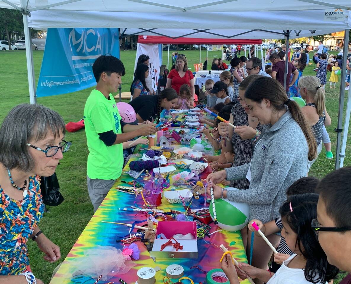 Participants delve into their art projects at a previous Mercer Island community event. Photo courtesy of MIVAL