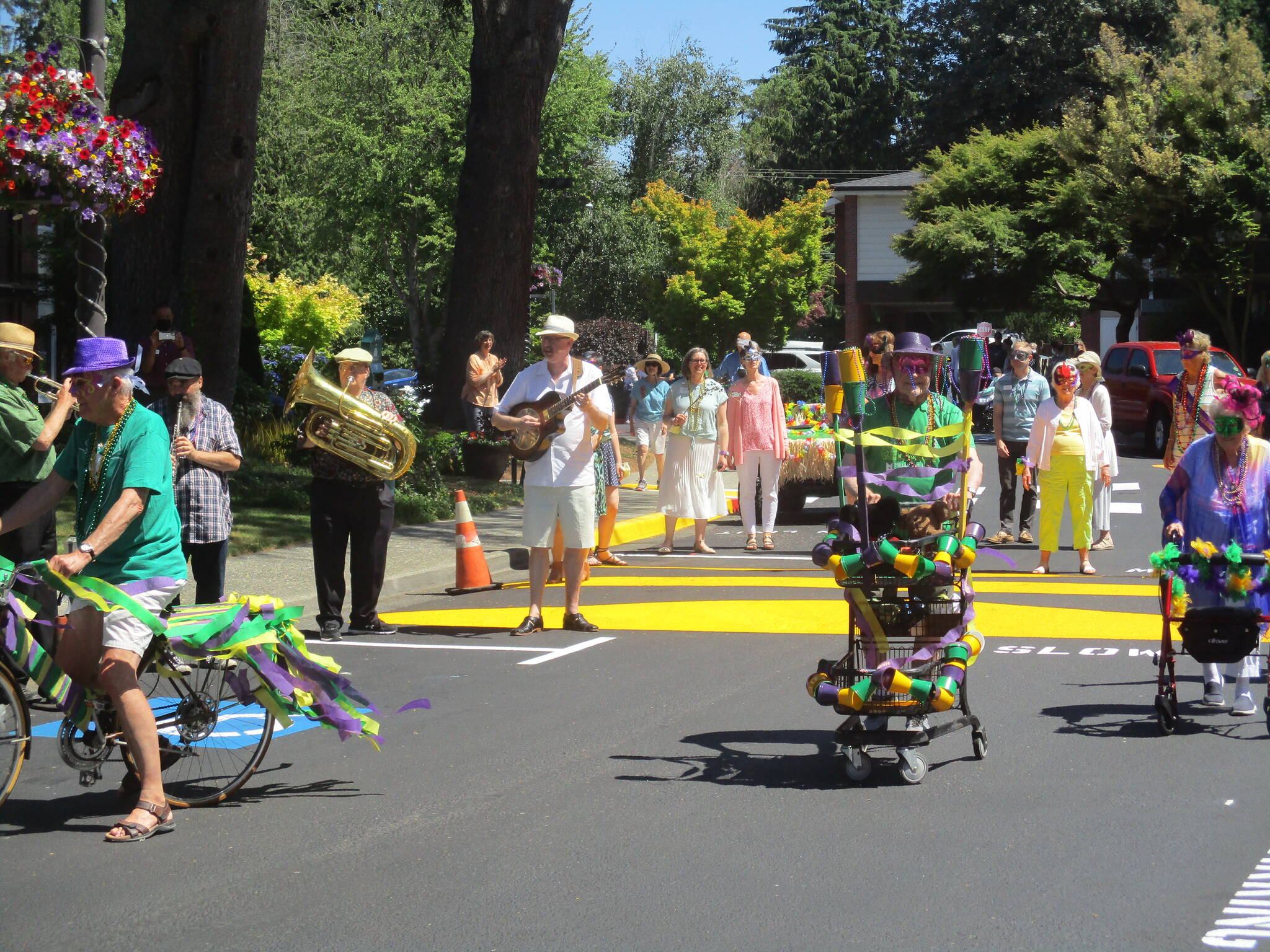 Covenant Living at the Shores on Mercer Island hosted its annual community celebration and fundraising campaign benefiting the Benevolent Care Fund the week of July 11-15. A Mardi Gras-themed parade was part of the fun during the event, which raised nearly $200,000 for benevolent care. The weeklong event also included beignets and coffee, an outdoor appetizer reception and dinner. Courtesy photo