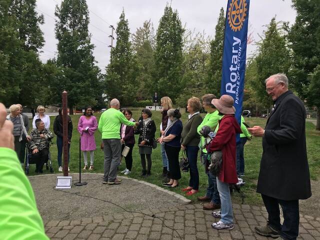 Rotary Club of Mercer Island members dedicate a peace pole in September 2019. Courtesy photo