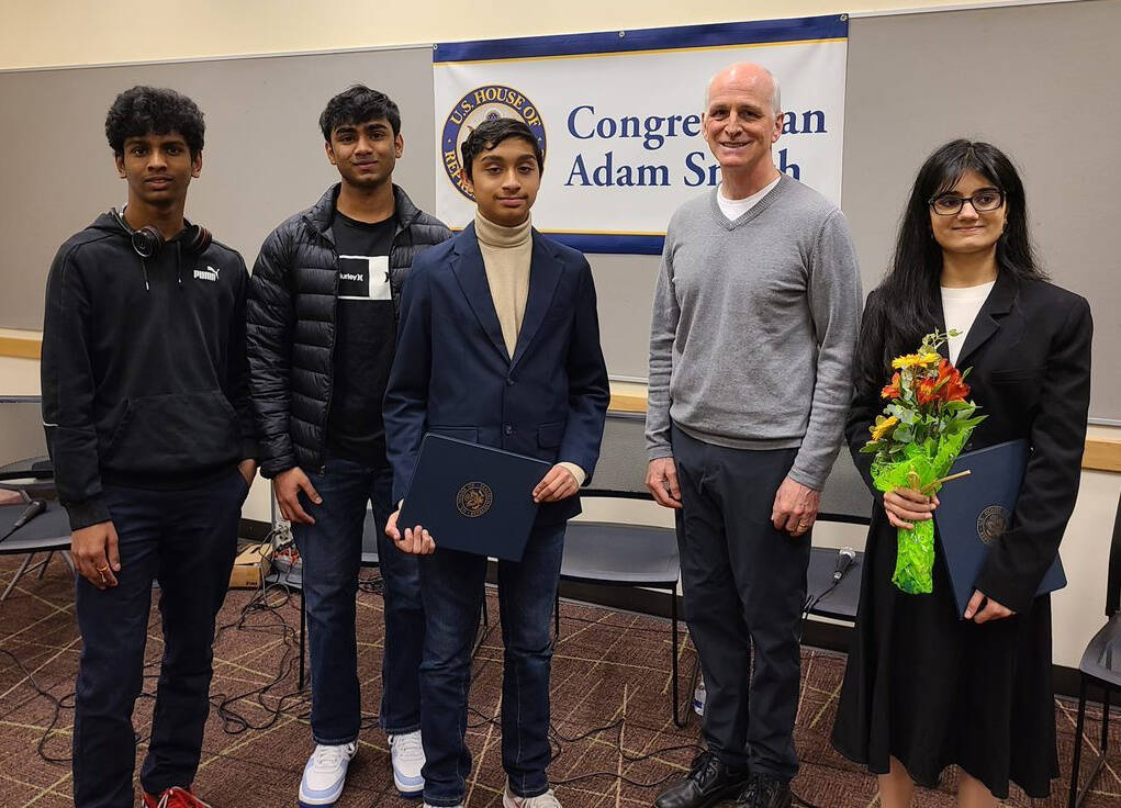 Mercer Island High School junior Subhadra Vadlamannati (pictured on the right) was honored as the winner of the 2022 Congressional App Challenge for Washington’s District 9 at its tech fair on April 22. The Islander won the prestigious challenge with her multilingual library app, EduLang, which utilizes interactive books and storytelling to guide non-English speaking students in grades K-5 to begin grasping the English language. Through the learning process, the low-resource language speakers can also preserve their native language proficiency. From left to right at the fair: Rahul Pessa, Interlake High School; Gaurang Pendharkar, Interlake High School; Aarnav Bhat, 2022 Congressional App Competition honorable mention; Congressman Adam Smith; and Vadlamannati. Courtesy photo