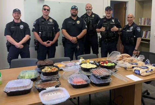 From left to right: Mercer Island Police Department officer Samuel Trudeaux, corporal Bobby Jira, sergeant Chad Schumacher, sergeant Scott Schroeder, officer Jordan Tranter and officer Art Munoz were among 11 department employees on patrol on July 4. Back the Blue community members, with the help of Solarium Kitchen and Bar Bellevue, provided deluxe burgers, jumbo hot dogs and salads to the watch. Courtesy photo