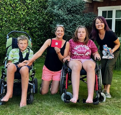 From left, Cooper, Jill and Charlotte Hawkins with Nancy Leung. Courtesy photo