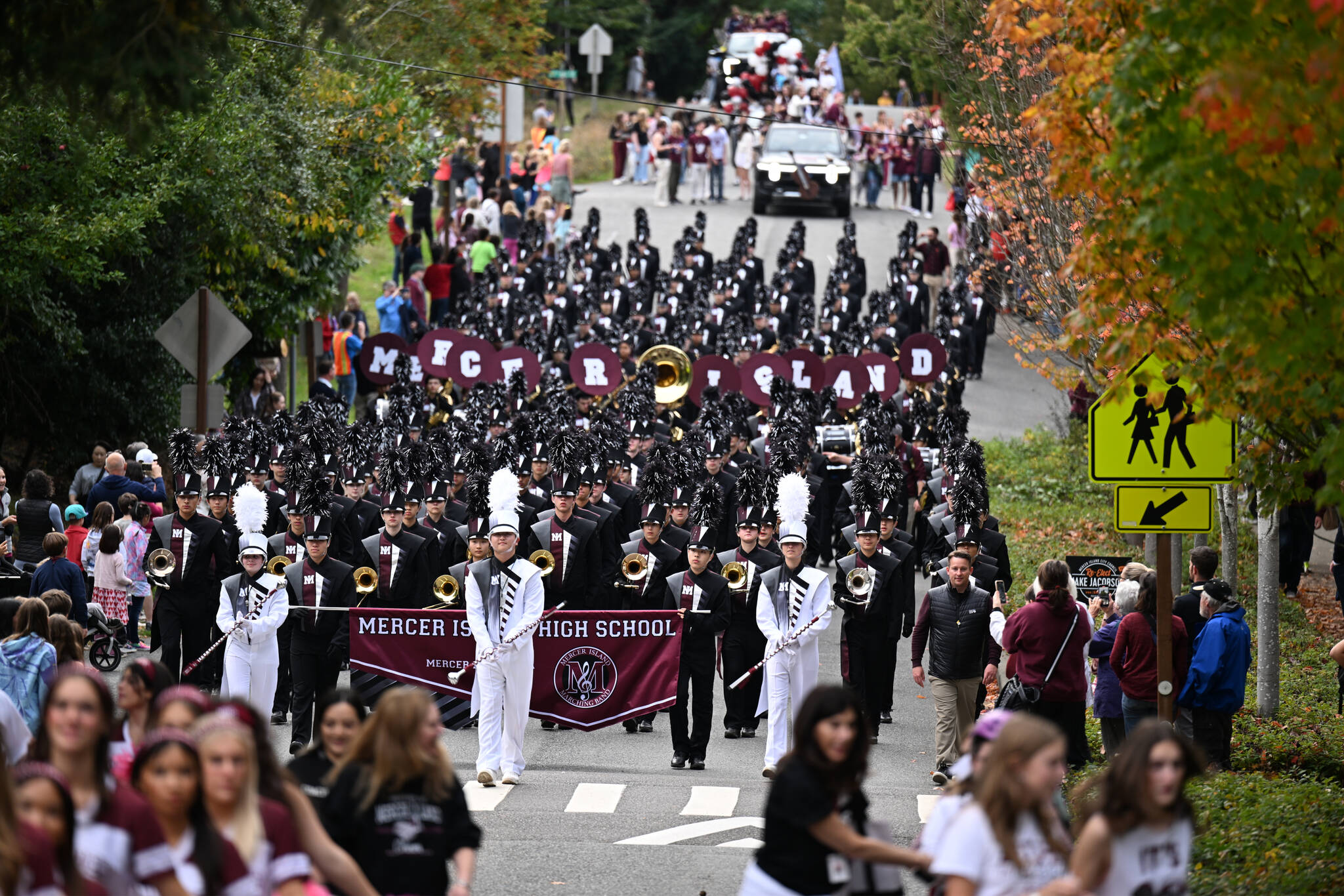 The Mercer Island High School marching band and copious Islander students and residents take over the streets by the school during the Homecoming parade on Oct. 13. Photo courtesy of Jim Jantos