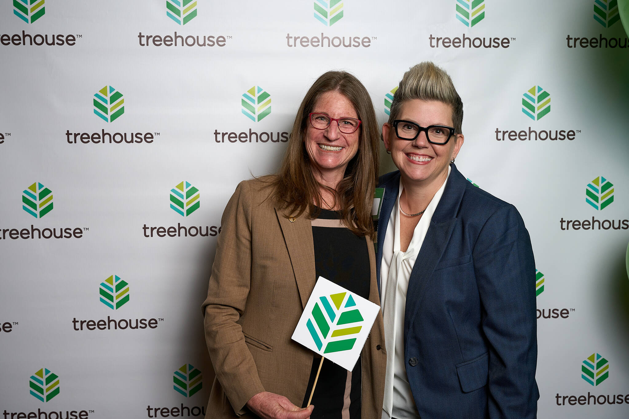 Rep. Tana Senn of Mercer Island, left, with Dawn Rains, CEO of Treehouse, at the nonprofit’s luncheon on April 23 in Seattle. Courtesy photo