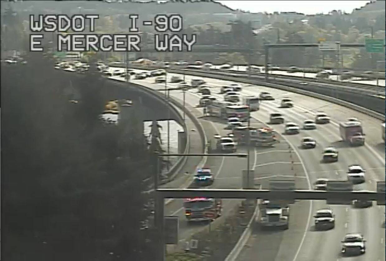 First-responder vehicles and trucks block the westbound Interstate 90 off-ramp to East Mercer Way on the morning of May 1. WSDOT X screenshot