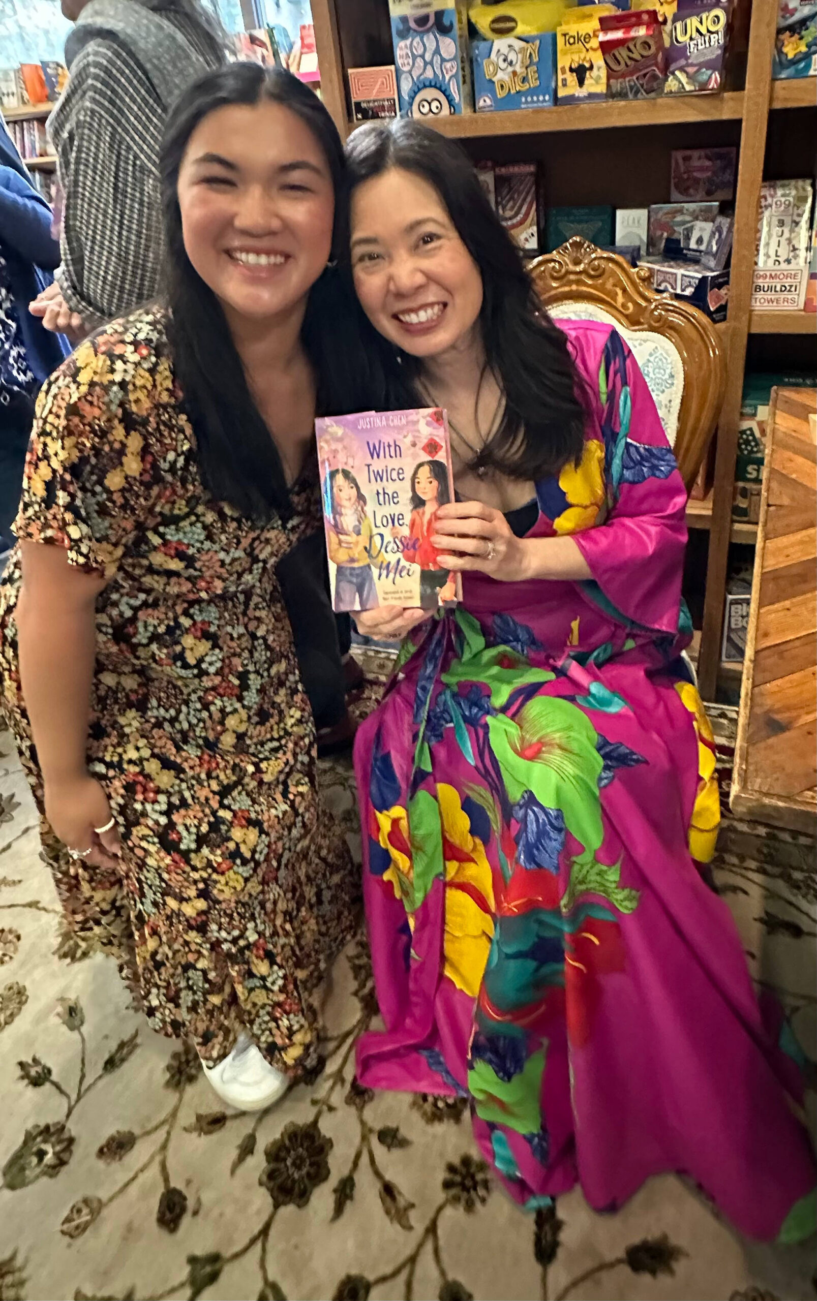 From left to right, Julia Johnson (former editorial assistant at Katherine Tegen Books/HarperCollins) and Justina Chen (author of “With Twice the Love, Dessie Mei”) visit at Chen’s May 7 book launch at Island Books on Mercer Island. It was a standing-room-only, sold-out event celebrating the release of Chen’s debut middle grade novel. Chen is a past winner of the Asian Pacific American Literature Award. Courtesy photo