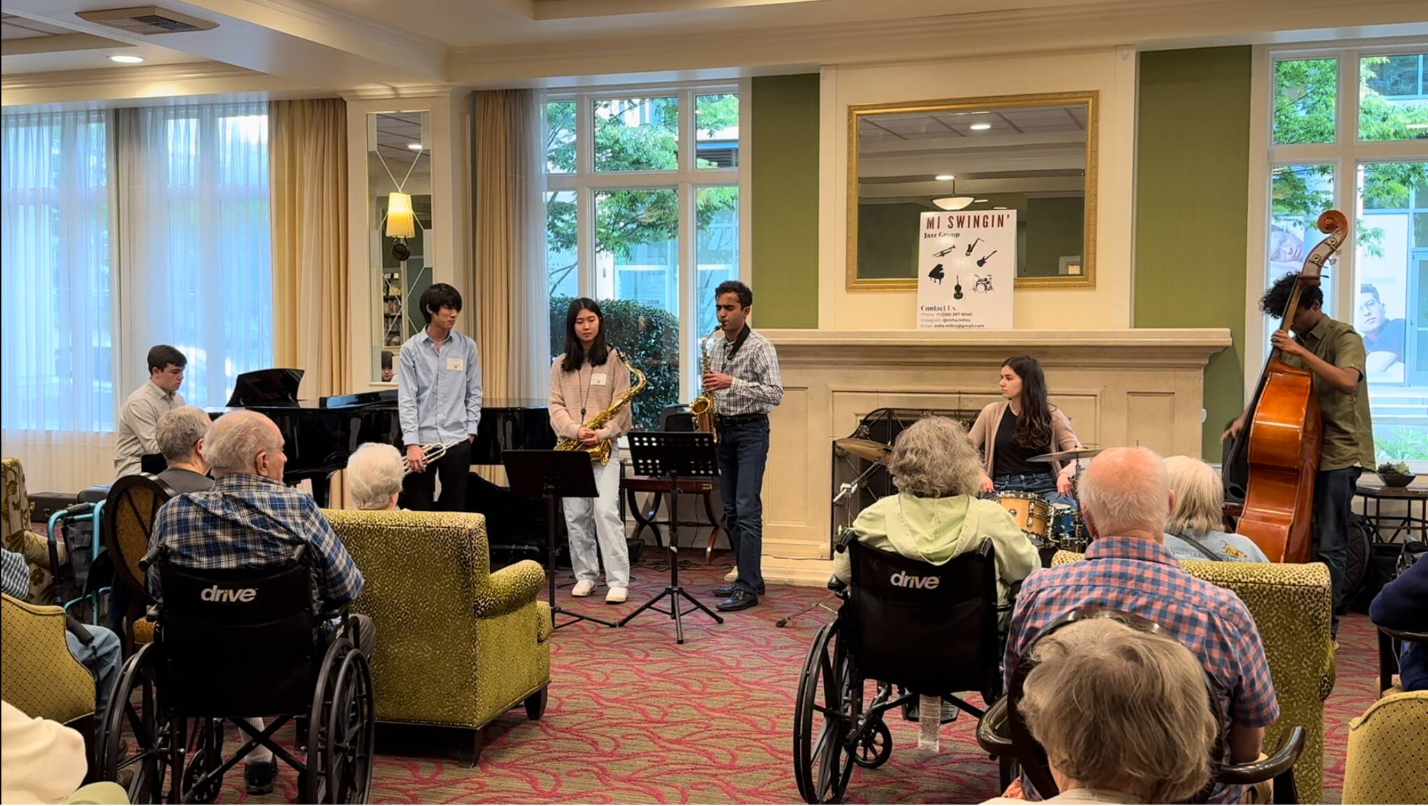 Members of the Mercer Island High School Music in the Community Club perform for seniors. Courtesy photo
