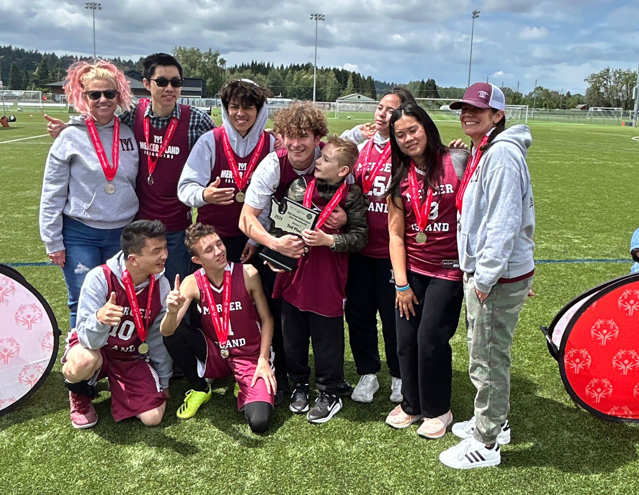 Mercer Island High School’s Unified Sports co-ed soccer team at the May 25 state championship game. From left to right: (Top) coach Jeniffer Blaser, Aaron Yang, Cortez Smith, Taven Glennon-Mulein, Madox Mulein (not on team), Jordan Balousek, Hayley Nguyen and coach Jamie Glennon. (Bottom) Gavin Fukano and Yura Vaganov. Photo courtesy of Janelle Brin