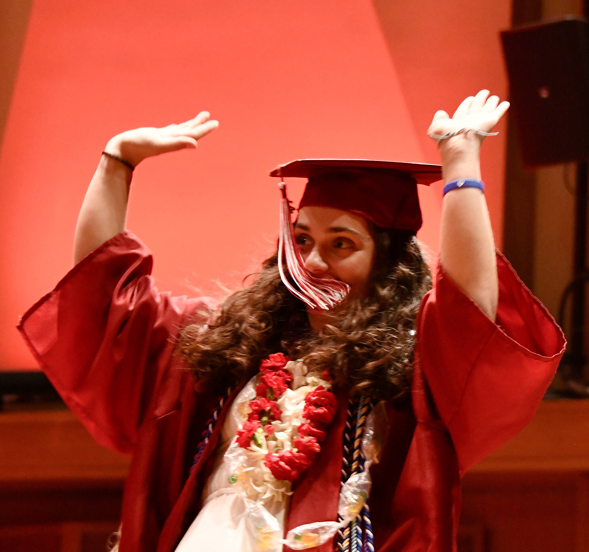 Mercer Island High School graduate Macy Poll is in full celebration mode while preparing to receive her diploma on June 8 at Benaroya Hall in Seattle. Andy Nystrom/ staff photo