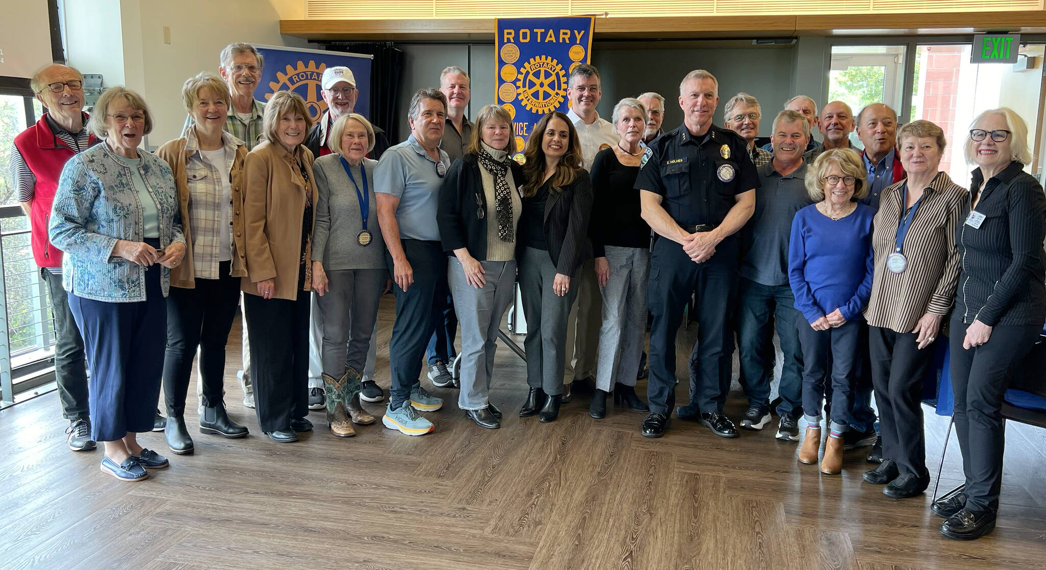 Rotary members and guests gather with fellow Rotarian and retiring Mercer Island Police Department Chief Ed Holmes on June 4 at the Mercer Island Community and Event Center. Courtesy photo