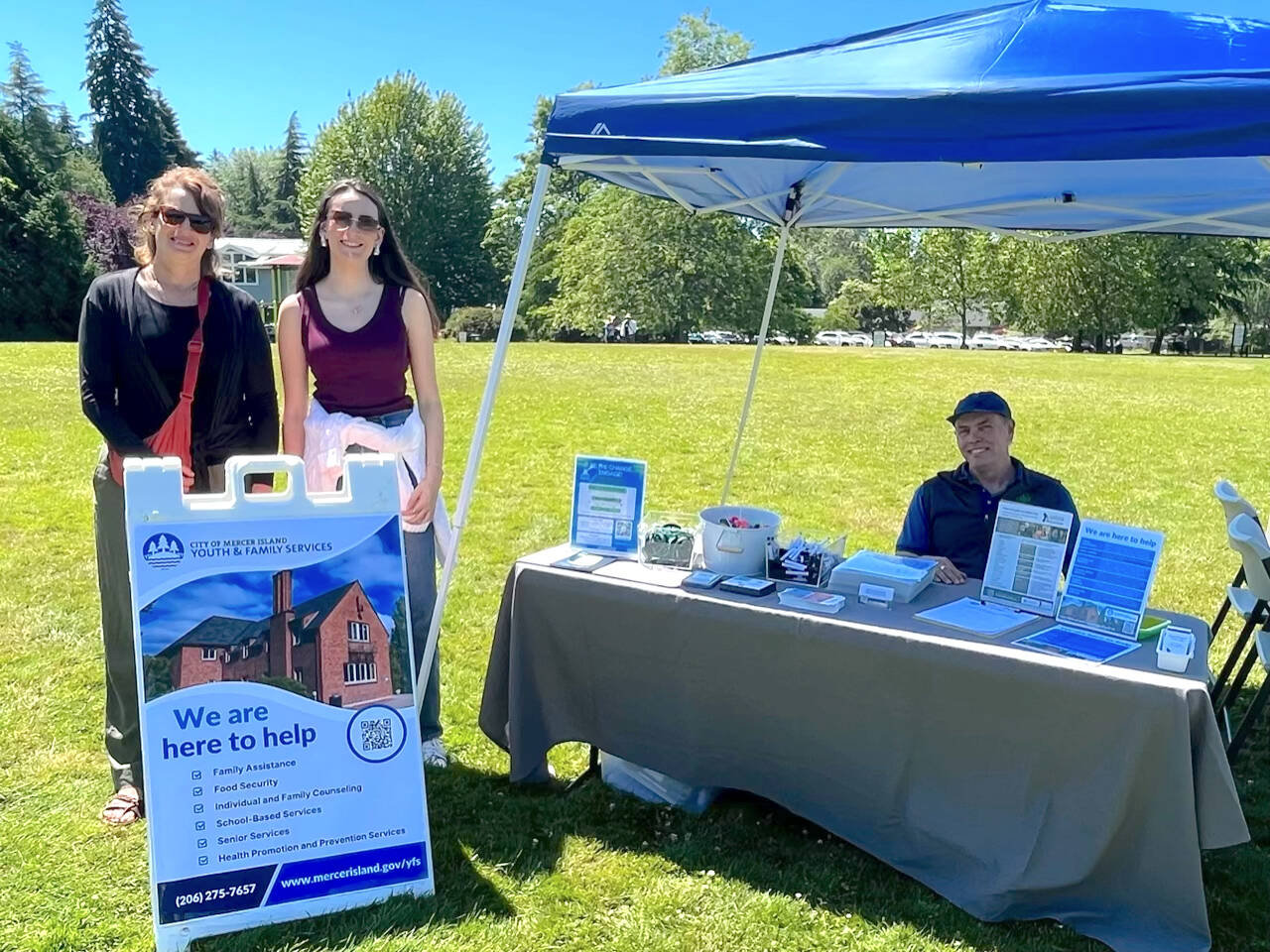 From left, Amy French, Mercer Island Youth and Family Services Foundation executive director; foundation summer intern Natalie Wingo; and YFS Administrator Derek Franklin attend the Juneteenth Community Celebration at Mercerdale Park. Courtesy photo