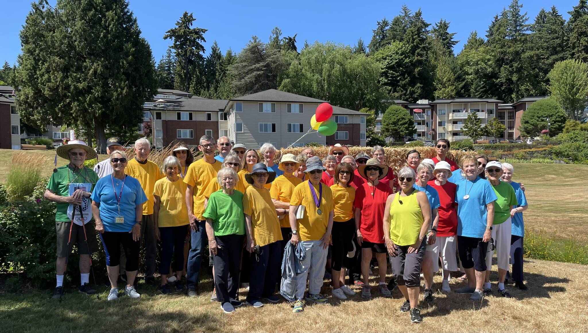 As the Paris Olympics were underway, more than 74 resident and employee athletes from Covenant Living at the Shores on Mercer Island recently participated in their own summer games. The events were a way for individuals at the senior living community to stay active through in a bit of friendly competition. Those events included cycling, swimming in Lake Washington, archery, javelin throw, volleyball and golf. To add to the theme, resident Peter Kennedy shared his experience of competing in figure skating during the winter games in 1948 and 1952 in Switzerland and Norway. He donned his original Olympic team coat during his presentation. Peter and his sister Karol Kennedy won a silver medal in the 1952 winter games. Courtesy photo