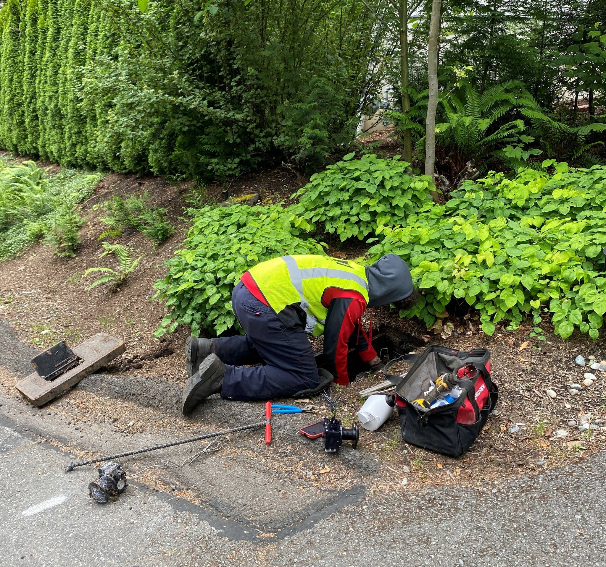 A Pedal Valves Inc. worker installs a new state-of-the-art digital water meter on Mercer Island. Photo courtesy of the city of Mercer Island