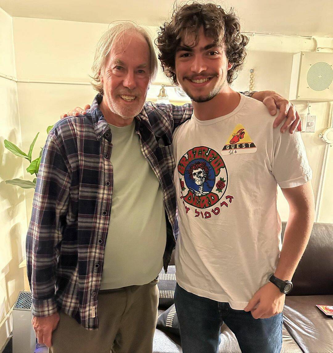 Little Feat keyboardist Bill Payne visits with Mercer Island High School senior Sam Paddor. Courtesy photo