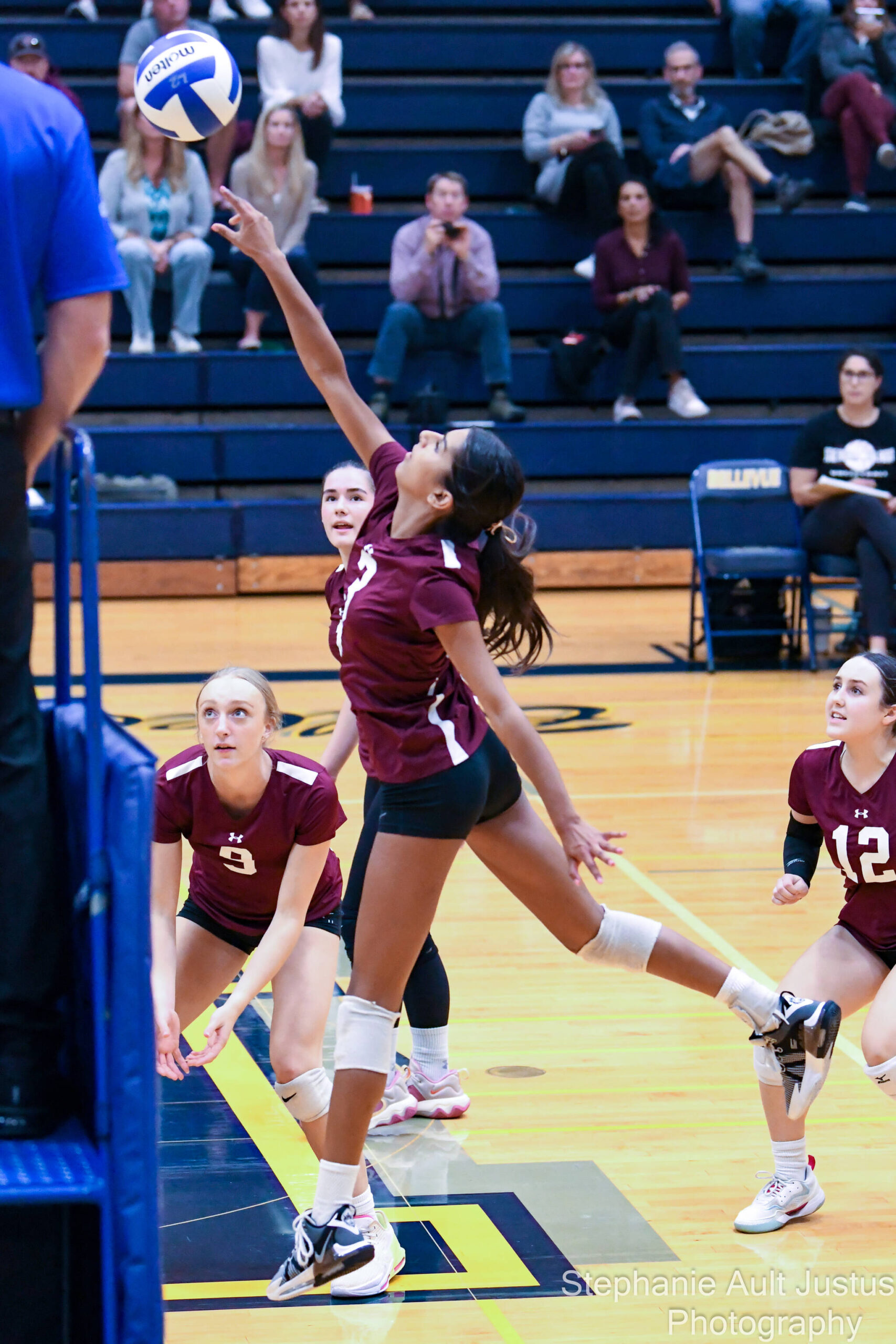 Bellevue High School defeated Mercer Island High School, 3-1, in volleyball action on Sept. 12. Attacking the net for MI is junior Aikum Bains. Photo courtesy of Stephanie Ault Justus