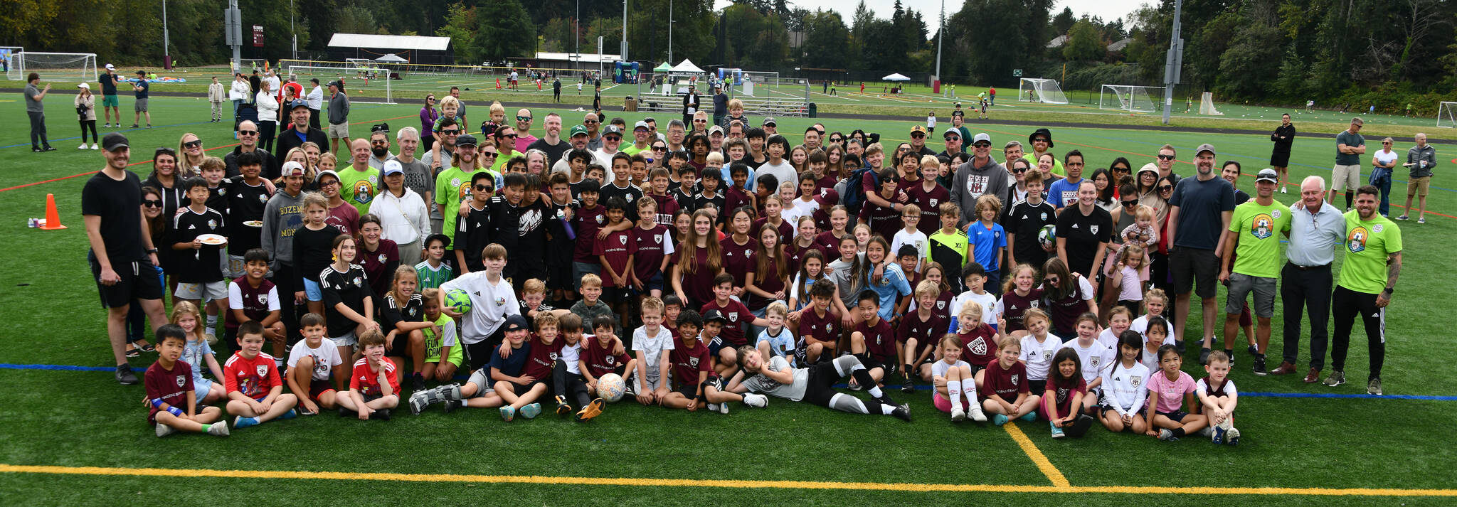 MIFC celebrated its 60th year on the soccer pitch with an anniversary event on Sept. 22 at Islander Middle School (IMS)/South Mercer Playfields. The day featured guest speakers Brad Evans (former professional player), Pete Fewing (former Seattle University head coach) along with words from some vital MIFC board members; the Veterans of Foreign Wars Color Guard; the National Anthem sung by IMS eighth-grader Ava Carlson; the IMS drill team; Mercer Island High School pep band; games and prizes and more. “I am so thankful to be part of 60 years of MIFC,” said Elliot Fauske, the event emcee who runs the MIFC micro soccer program. He praised the MIFC tradition and mission of being community based with a volunteer-run board. Fewing noted in his speech to the players: “Enjoy playing, enjoy your teammates, enjoy your coaches, your opponents. Thank the referees.” Staff photo/Andy Nystrom