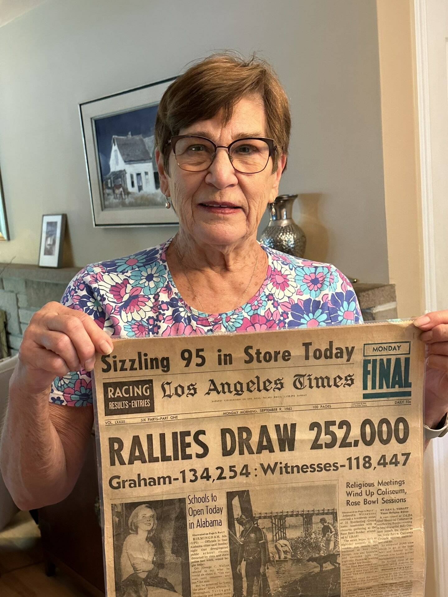 Greg’s neighbor Linda Nicholl holding front page of Sept 9, 1963 LA Times featuring her father’s cover story Photo courtesy of Greg Asimakoupoulos