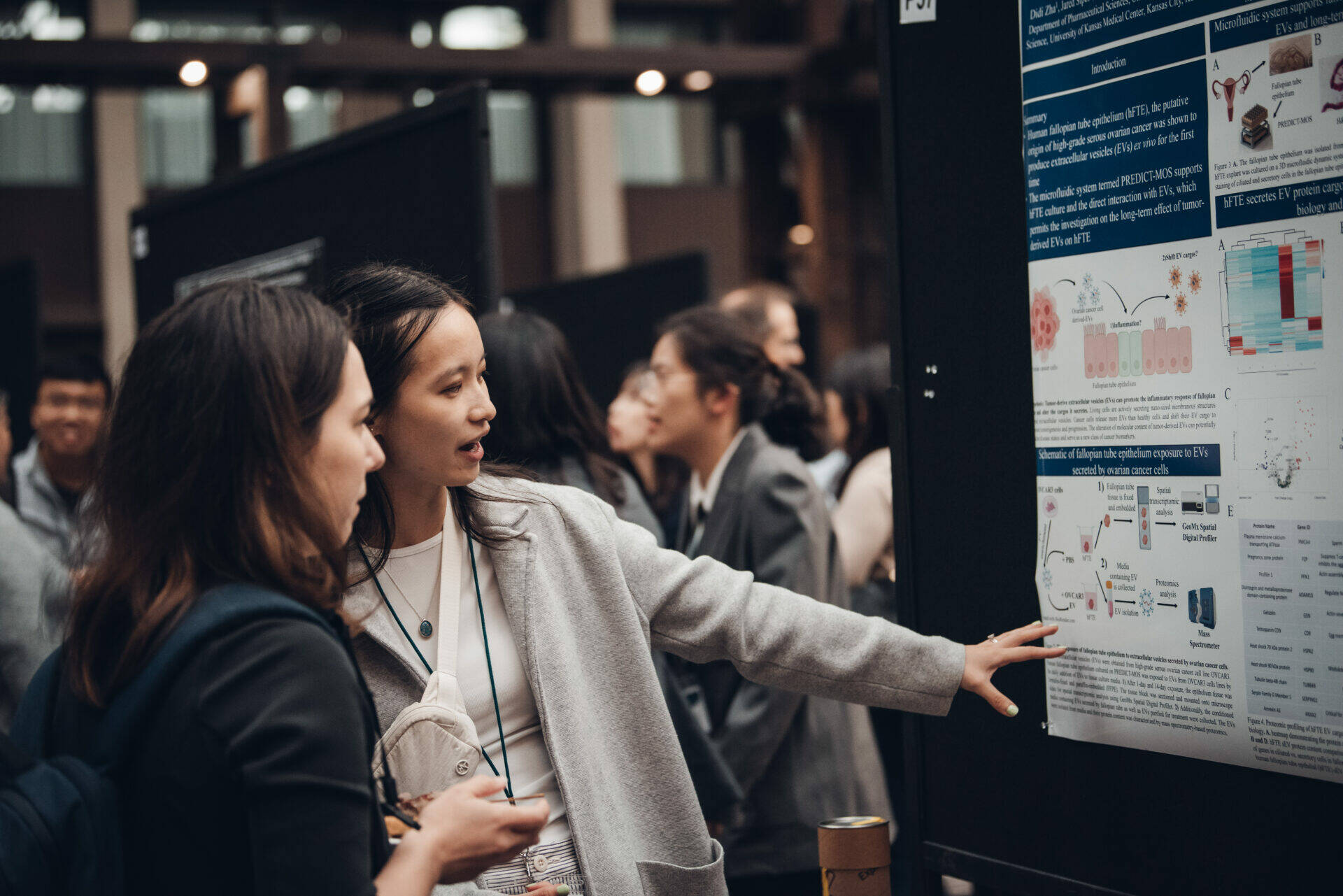 Attendees check out an information board at the Rivkin Center’s 15th Biennial Ovarian Cancer Research Symposium, which took place on Sept. 20-21 at the Seattle Airport Marriott. Photo courtesy of Vivian Hsu Photography