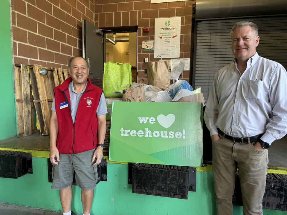 Rotary Club of Mercer Island President Benson Wong and President-Elect Todd White recently delivered bags and boxes of clothes and accessories to Treehouse in Seattle. The Treehouse nonprofit is focused on educational needs of youth in foster care. Wong and White, plus fellow Rotarians of the “Laundry Brigade,” washed, dried and sorted all these clothes from the Stroum Jewish Community Center’s lost and found collection. Photo courtesy of the Rotary Club on Mercer Island