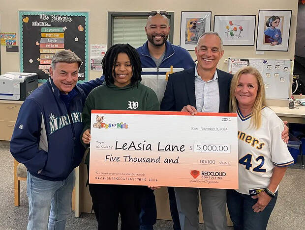 From left to right: Rick Rizzs, Le’Asia Lane, Trent Henderson, Brett Alston and Nancy Henderson. Photo courtesy of the Mercer Island School District