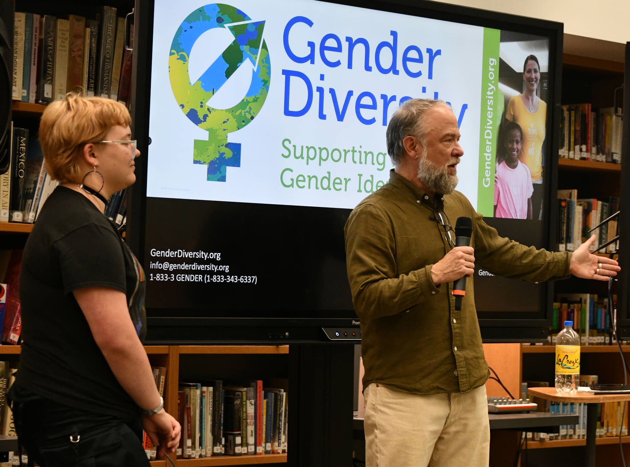 Nick Kangas, left, and Aidan Key speak at the “Understanding the Needs of Transgender Youth” presentation on Oct. 10 in the Mercer Island High School library. Andy Nystrom/ staff photo