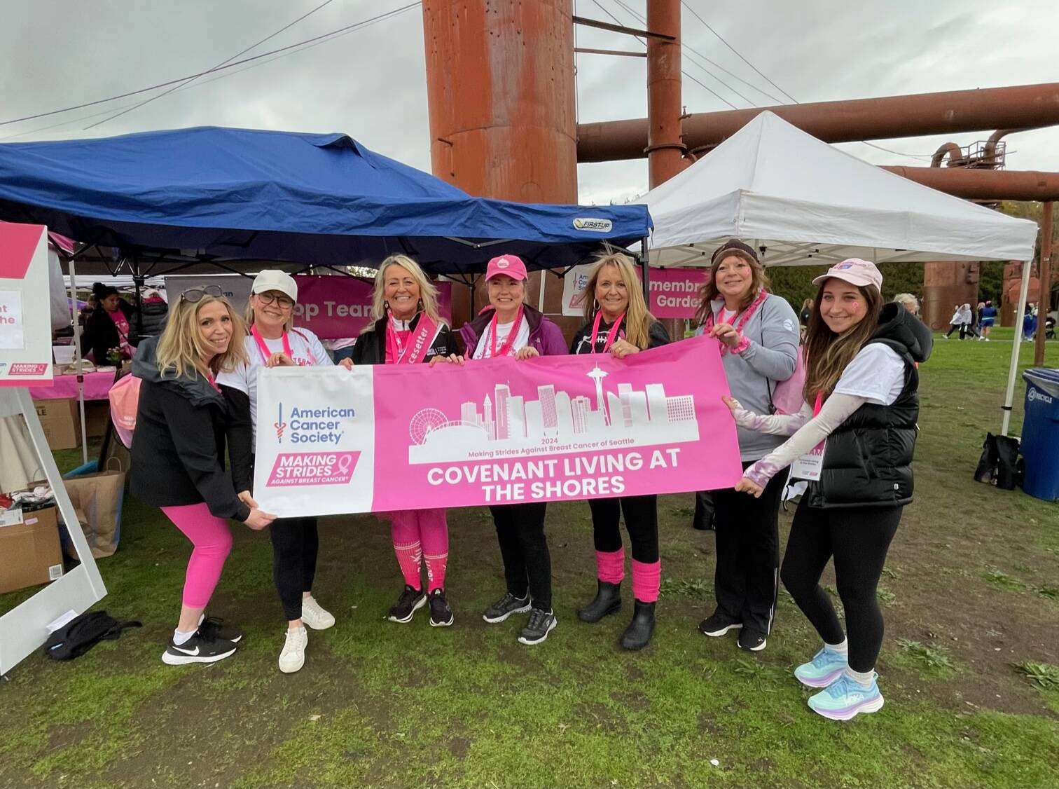 Showing off their banner are members of the top fundraising team from Covenant Living at the Shores on Mercer Island. From left to right: Kylene Daligcon, Rachael Gerdis, Roxanne Stickney, Victoria Wenick, Gail Schmidt, Christabel Oliver and Jasmina Uxa. Courtesy photo