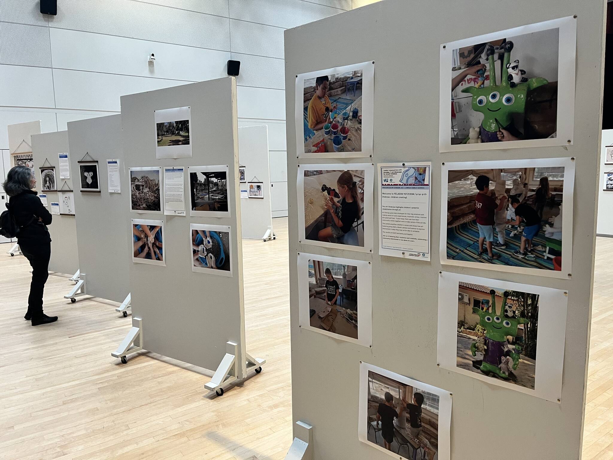 Attendees viewed the Oct. 7 Art Showcase by Israeli Children full exhibit on Oct. 20 at the Stroum Jewish Community Center on Mercer Island. Photo courtesy of the Stroum Jewish Community Center and Jewish Family Service of Seattle