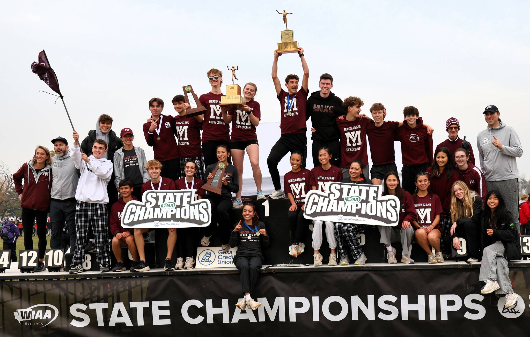 Mercer Island High School’s boys and girls 3A state cross country team champions. Photo courtesy of Scott Knoblich