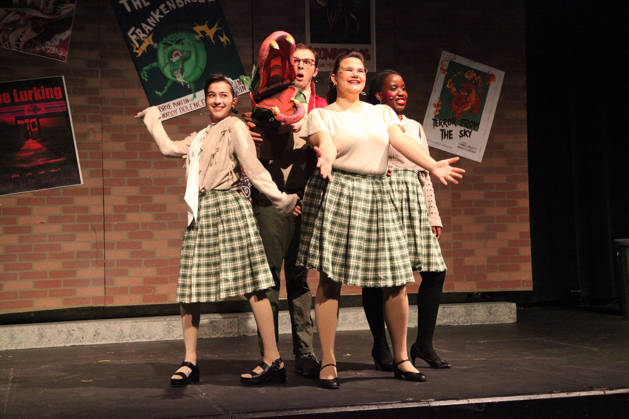 From left to right, Kaori Lancaster, Kyle Gerstel, Pilar Bousono and Joy Rurangwa will perform in the Mercer Island High School Drama department’s production of “Little Shop of Horrors.” Here, they’re pictured at a full dress rehearsal. Photo courtesy of Alec Chvany