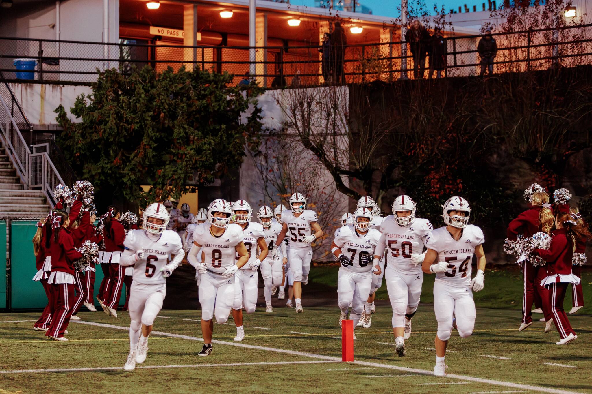 Mercer Island High School football players run onto the field on Nov. 15 at Seattle’s Memorial Stadium. Photo courtesy of Linda Kercher