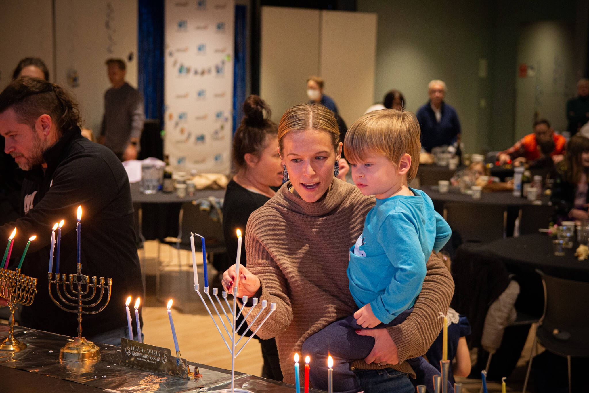 A scene from a previous Stroum Jewish Community Center Hanukkah dinner. Photo courtesy of Justin Bradford