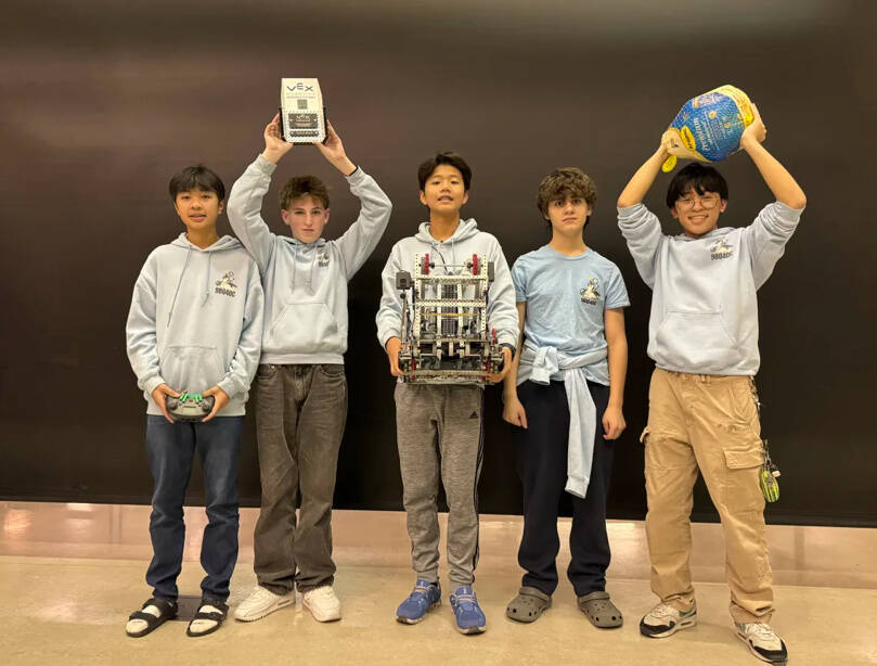 Mercer Island High School’s freshman VEX Robotics Team, the Slippery Penguins, won the championship title on Nov. 23 at the annual Lake Stevens Turkey Trot Invitational Tournament. The team (10-2 overall at the event) overcame power outages, and the team’s hard work under flashlight conditions at times paid off with a trophy and a fresh turkey prize for Thanksgiving. They dominated the knockout stage with a 4-0 record, including a rematch in the final. The team of Harry Nguyen (captain), Til Wyss, Henry Xing, Zevi Danielli and Jeremy Leung were among the top 32 Washington high school teams competing at Cavelero Mid High School in Lake Stevens. Photo courtesy of the Mercer Island School District